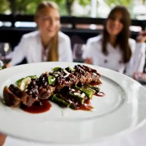 Two girls having dinner at a top restaurant in Mexico City